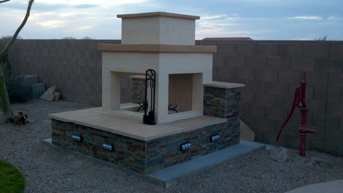 Outdoor fireplace with stacked stone