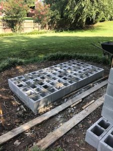 cinderblock concrete slab backyard grass diy outdoor fireplace