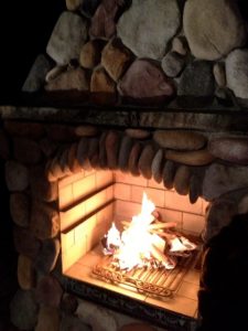 DIY outdoor fireplace with fire