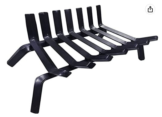Black wrought iron elevated fire grate for DIY outdoor fireplace used to hold firewood while burning in a firebox.